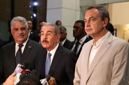 The Chancellor of the Dominican Republic Miguel Vargas (L), the President of Dominican Republic Danilo Medina (C) and Former Spanish Prime Minister Jose Luis Rodriguez Zapatero (R) talk to the media, after participating in a meeting to resume brokered talks between Venezuelan government's and the opposition in Santo Domingo, Dominican Republic September 13, 2017. REUTERS/Ricardo Rojas