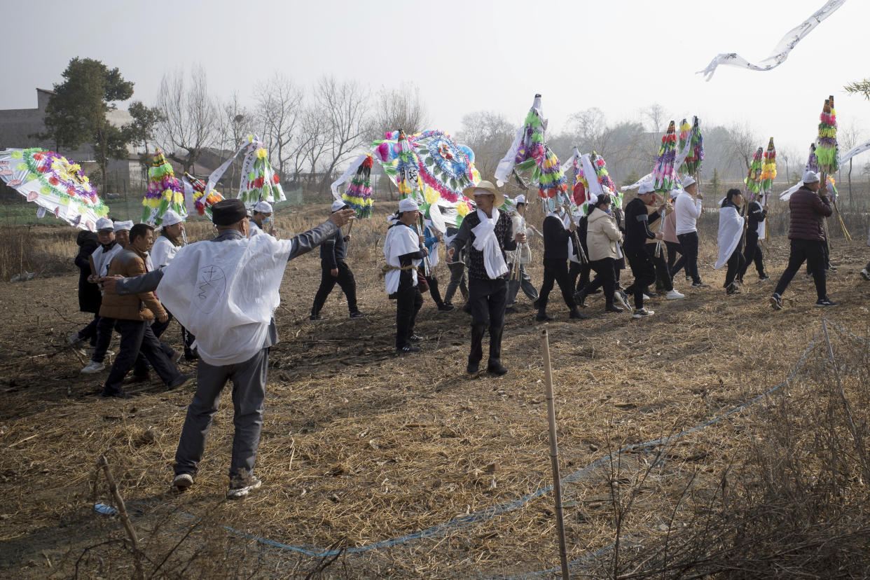 Medical researchers projected in a study that rural areas in China would be hit by Covid-19 infections in January. Typically hundreds of millions of people travel during the Lunar New Year. (CCP/ColorChinaPhoto / AP)