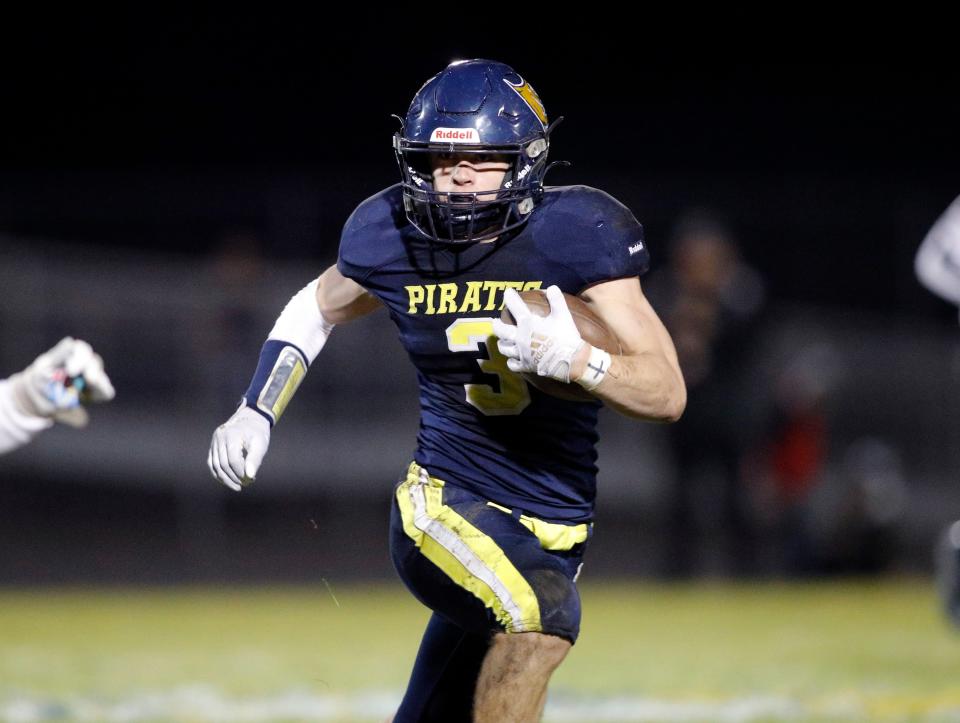 Pewamo-Westphalia's Brayton Thelen runs against Bath, Friday, Nov. 3, 2023, at Pewamo-Westphalia High School.