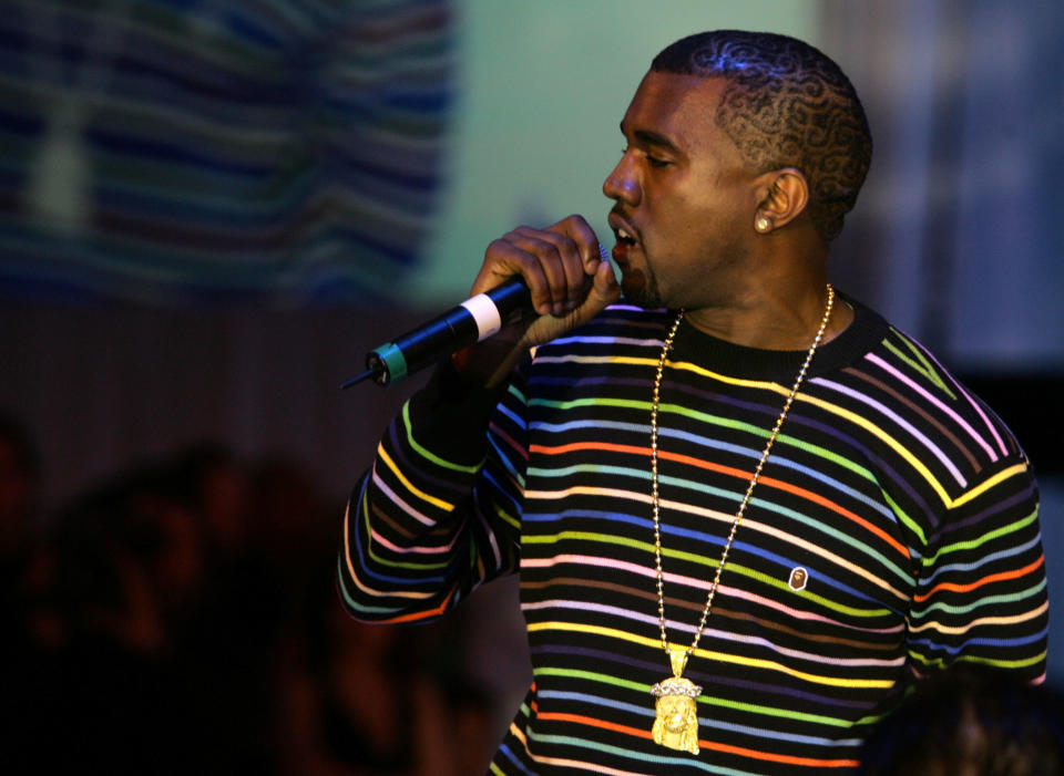 Singer Kanye West performs onstage at the 4th Annual "Ten" Fashion Show on February 22, 2005 in Hollywood, California