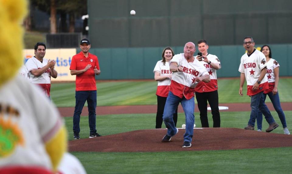 Fresno mayor Jerry Dyer throws out the first pitch as the Fresno Grizzlies played their home opener for the 2023 season, the first in a six-game series against the Stockton Ports Tuesday, April 11, 2023 in Fresno.