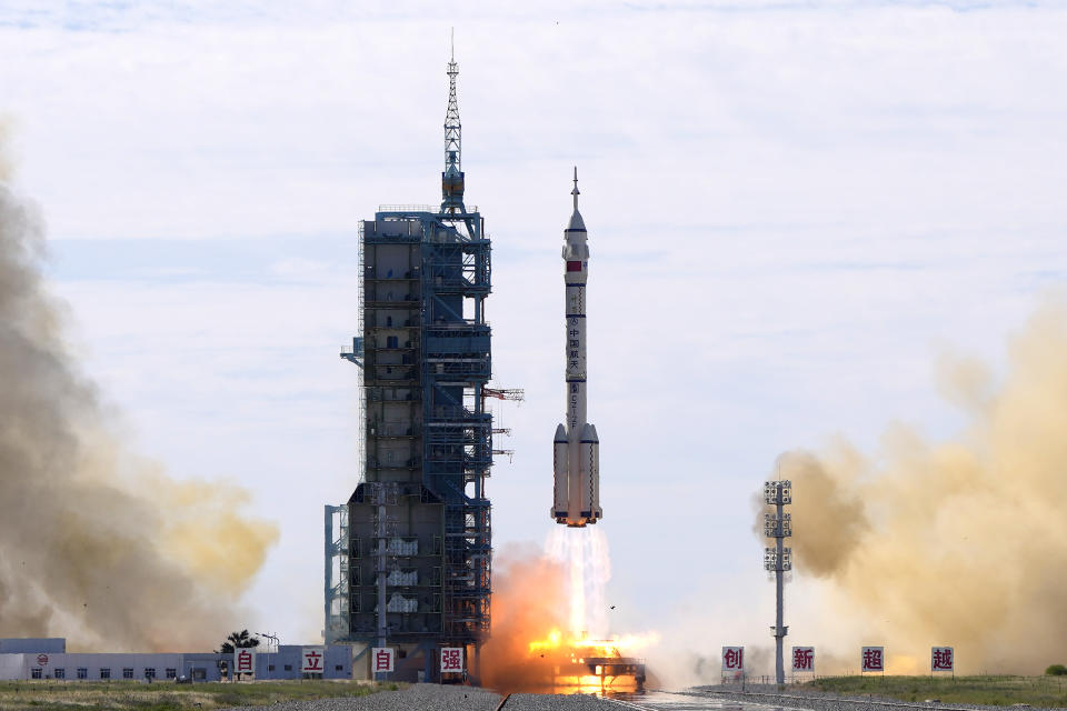 A Long March-2F Y12 rocket carrying a crew of Chinese astronauts in a Shenzhou-12 spaceship lifts off at the Jiuquan Satellite Launch Center in Jiuquan in northwestern China, Thursday, June 17, 2021. China has launched the first three-man crew to its new space station in its the ambitious programs first crewed mission in five years. (AP Photo/Ng Han Guan)