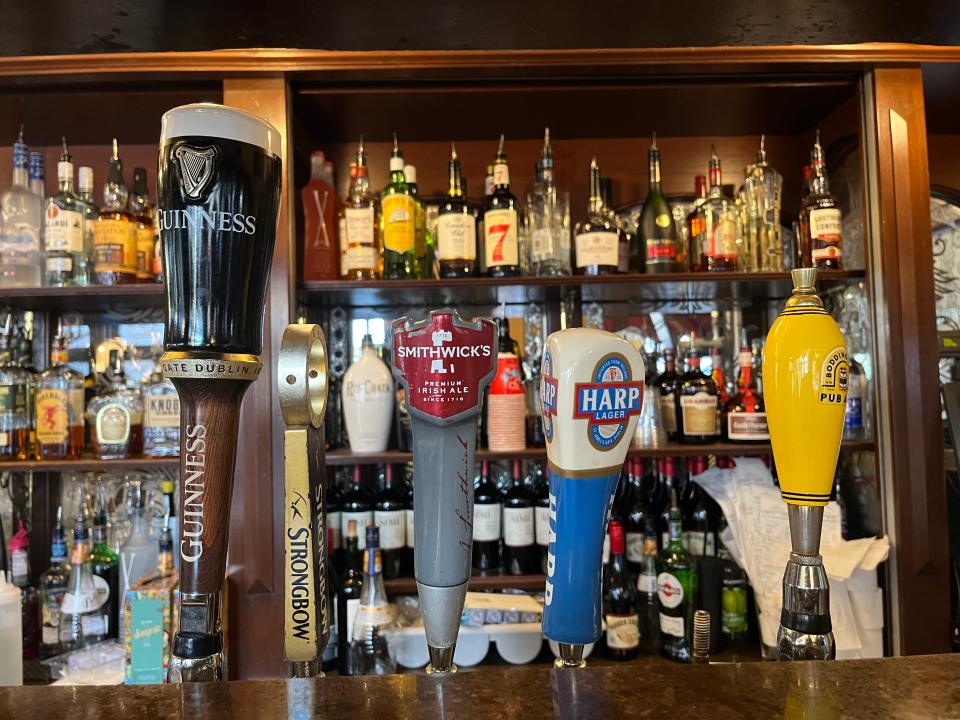 taps of english beers at rose and crown pub in epcot