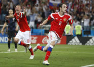 <p>One-time Brazil cap Mario Fernandes celebrates equalising in second half extra time for Russia </p>