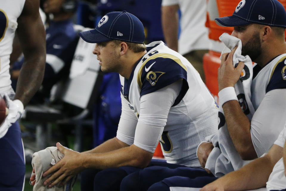 Los Angeles Rams quarterback Jared Goff (16) sits on the bench in the second half of an NFL football game against the Dallas Cowboys in Arlington, Texas, Sunday, Dec. 15, 2019. (AP Photo/Michael Ainsworth)