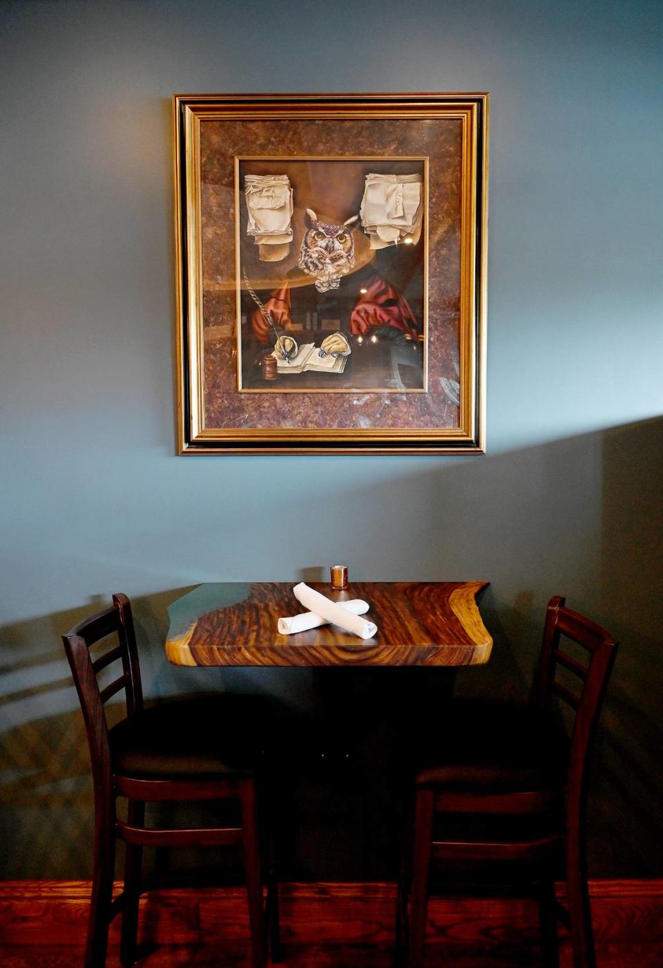 The bar features tables hand made by owner, Rich Knowles father, Dick, at EnRich Bistro in Bradenton on Tuesday, May 14, 2024.