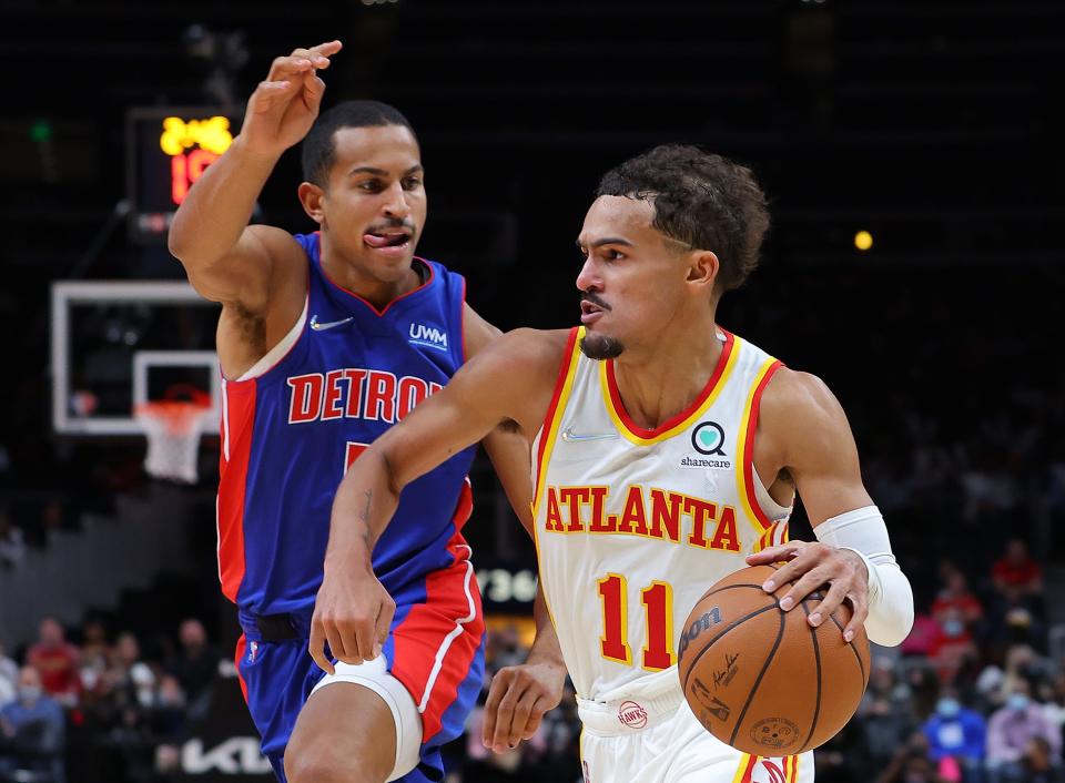 Hawks guard Trae Young drives against Pistons guard Frank Jackson during the second half of the Pistons' 122-104 loss on Monday, Oct. 25, 2021, in Atlanta.
