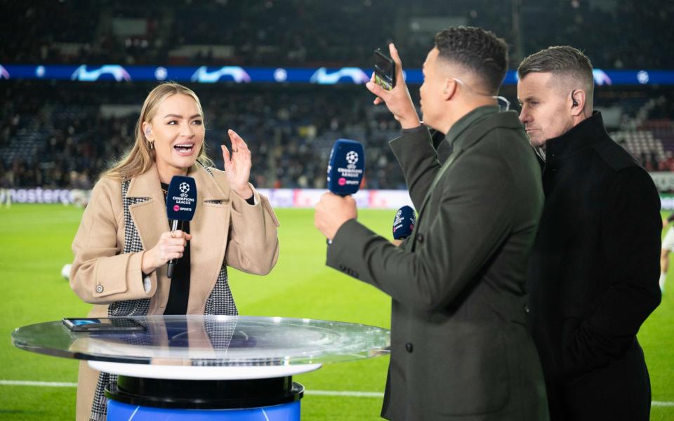 Laura Woods, pictured on pitch side at a  Champions League match, says she lived in 'real fear'