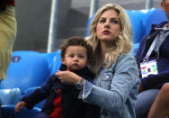 <p>Raphael Varane’s wife Camille Tytgat and son Ruben attend the 2018 FIFA World Cup Russia Semi Final match between Belgium and France at Saint Petersburg Stadium on July 10, 2018 in Saint Petersburg, Russia. (Photo by Alexander Hassenstein/Getty Images) </p>