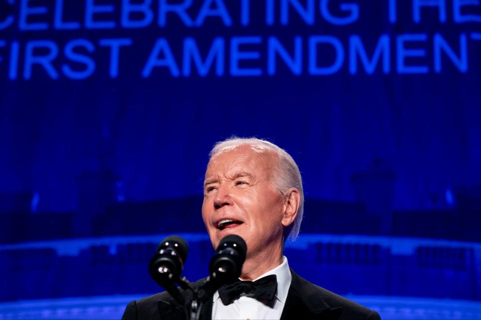 President Joe Biden speaks on stage at the White House Correspondents Dinner (EPA)