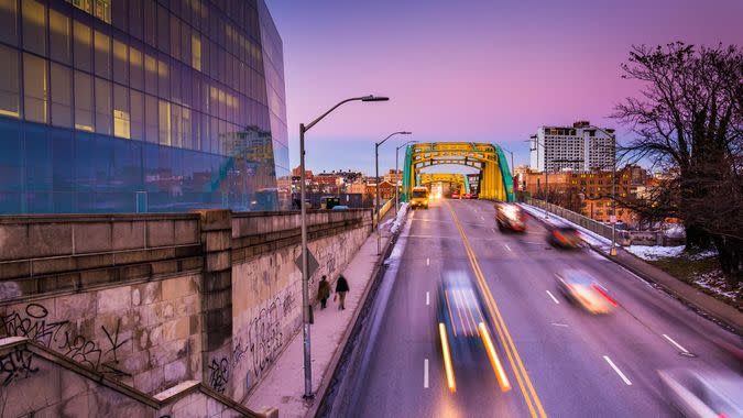 Traffic moving on Howard Street at twilight, in Baltimore, Maryland.