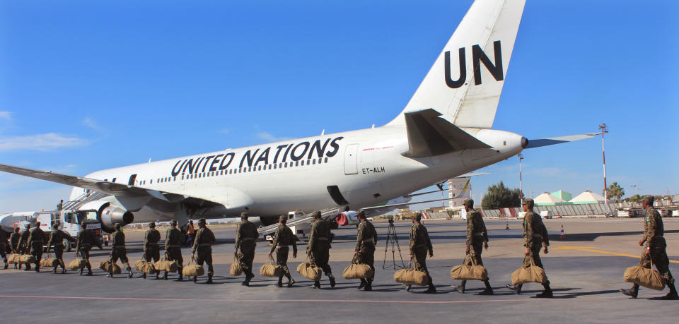 Mauritanian soldiers board a United Nations flight to Central African Republic as a peacekeeping force in Nouakchott, Mauritania, on Feb 21, 2016. (Photo: Ahmed Mohamed/AP)