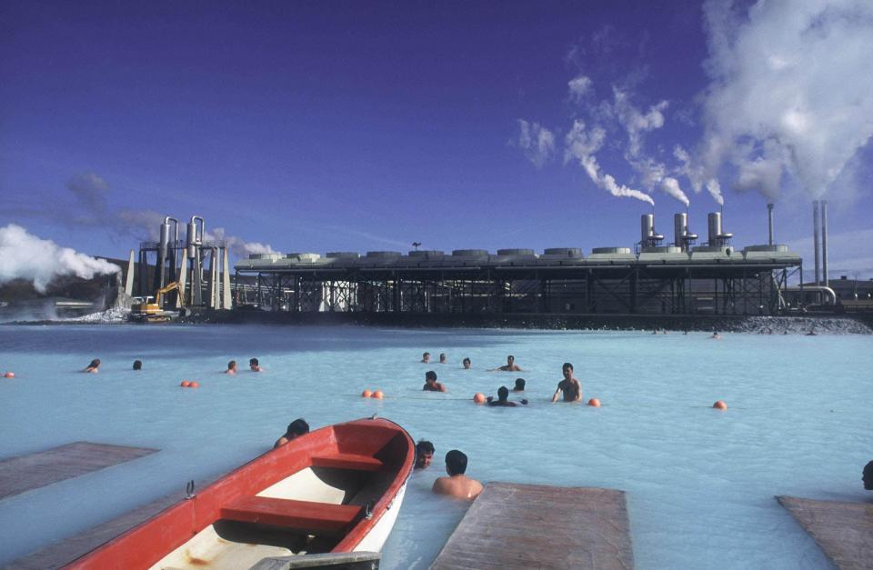 File photo: A general view of some tourists swimming in the Blue Lagoon hot pool on the Reykjanes Peninsula on Iceland. To the rear of the picture is the Svartsengi Power Plant. This is a world famous hot pool.