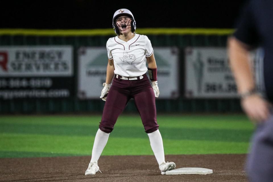 Calallen batter Megan Geyer celebrates a double during the Class 4A area round playoff game on Friday, May 3, 2024, in Sinton, Texas.