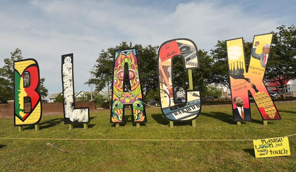 "Black Lives Do Matter" installation by Wilmington artist Greyson Davis/Haji P/HP Fangs, along Third Street by the Isabel Holmes Bridge.