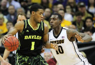 KANSAS CITY, MO - MARCH 10: Perry Jones III #1 of the Baylor Bears drives against Ricardo Ratliffe #10 of the Missouri Tigers in the first half during the championship game of the 2012 Big 12 Men's Basketball Tournament at Sprint Center on March 10, 2012 in Kansas City, Missouri. (Photo by Jamie Squire/Getty Images)