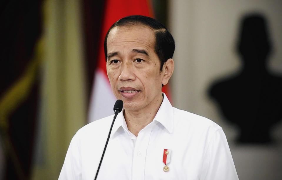 In this photo released by Indonesian Presidential Palace, Indonesian President Joko Widodo, delivers his televised remarks at the Merdeka Palace in Jakarta, Indonesia, Monday, April 26, 2021. Widodo expressed his condolences after an Indonesian brigadier general was killed in an ongoing clash between security forces and a rebel group in restive Papua province. (Indonesian Presidential Palace via AP)