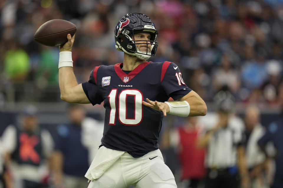 Houston Texans quarterback Davis Mills passes against the Tennessee Titans during the first half of an NFL football game Sunday, Oct. 30, 2022, in Houston. (AP Photo/Eric Christian Smith)