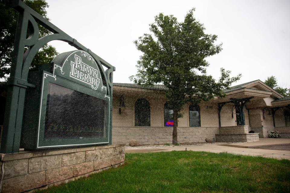 The exterior of the Patmos Library Friday, Aug. 5, 2022, in Jamestown Township. The future of the library is uncertain after the failure of the renewal of a property tax millage to fund the library after a campaign. The millage was voted down after a small conservative group campaigned against the millage after the library rejected removing LGBTQ materials from its shelves.