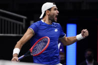 Team Europe's Matteo Berrettini, of Italy, celebrates his victory over Team World's Felix Auger-Aliassime, of Canada, at Laver Cup tennis, Friday, Sept. 24, 2021, in Boston. (AP Photo/Elise Amendola)