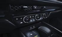 <p>The four main dash vents are set behind an attractive cockpit-spanning mesh that hides their directional vanes, and the climate-control interface is attractive and thoroughly self-explanatory.</p>
