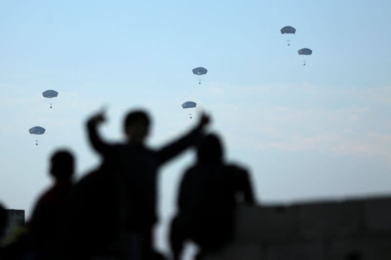 U.S. military carry out its first aid over Gaza, amid the ongoing the conflict between Israel and the Palestinian Islamist group Hamas, in Gaza City