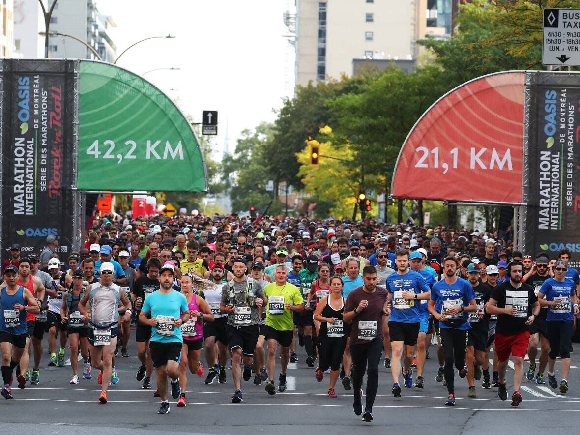 Runners start during the Oasis Rock 'n' Roll Marathon in Montreal in 2019, the last time it was held in the city. (Al Bello/Getty Images - image credit)