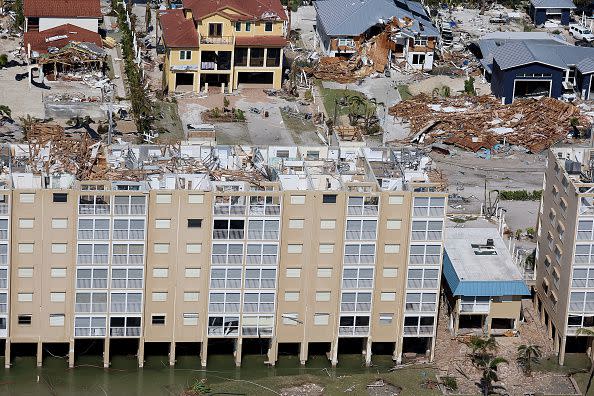 FORT MYERS BEACH,FLORIDA - SEPTEMBER 29: In an aerial view, damaged buildings are seen as Hurricane Ian passed through the area on September 29, 2022 in Fort Myers Beach, Florida. The hurricane brought high winds, storm surge and rain to the area causing severe damage. (Photo by Joe Raedle/Getty Images)