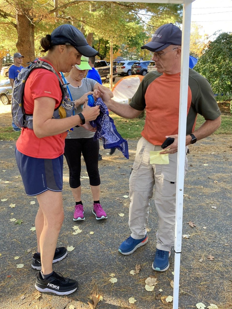 Ultramarathoner Christy Boris trades backpacks with her husband Mike