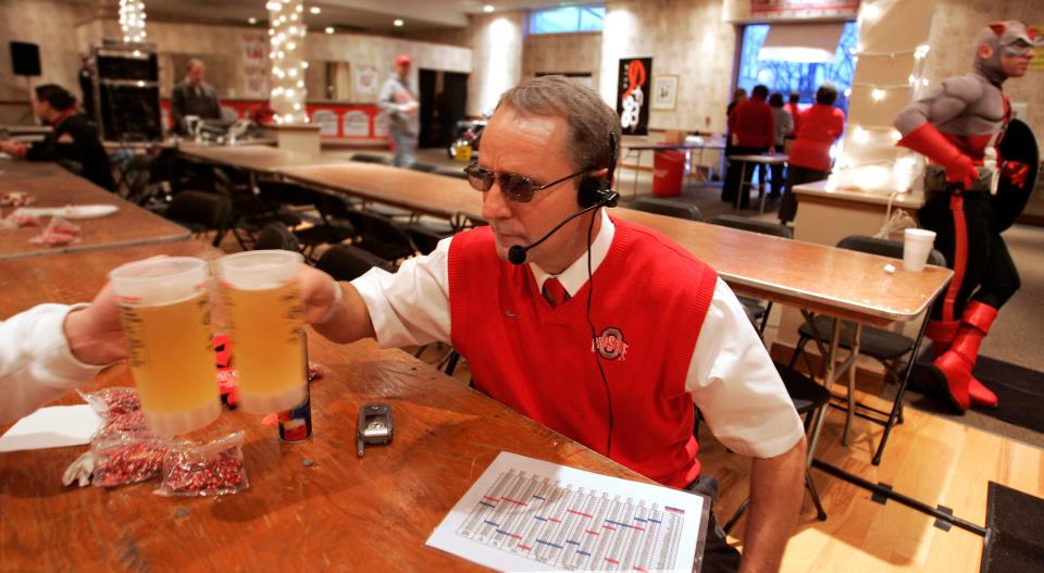 Curtis West of Cumberland, Ohio, dresses like OSU Coach Jim Tressel as part of a look-a-like contest held at the café in 2007.
