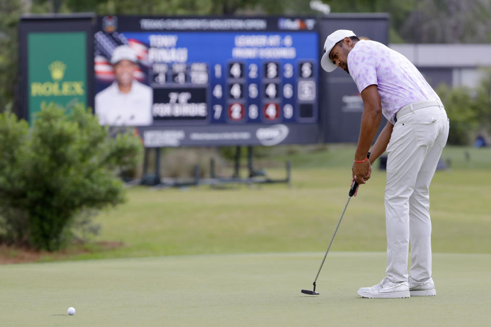 Defending champion Tony Finau misses his putt on the ninth green during the first round of the Houston Open golf tournament Thursday, March, 28, 2024, in Houston. (AP Photo/Michael Wyke)