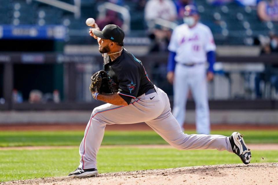 Miami Marlins relief pitcher Yimi Garcia throws in the ninth inning of a baseball game against the New York Mets, Saturday, April 10, 2021, in New York.