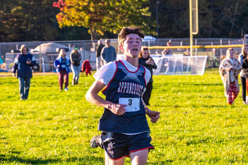 Apponequet's Aydan Fournier sprints to the finish line.