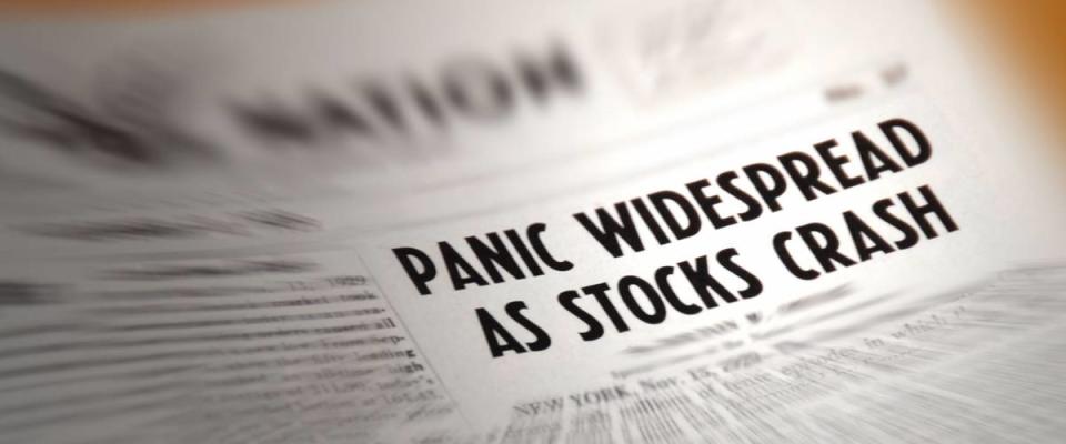 Newspaper headline warning of stock market crash