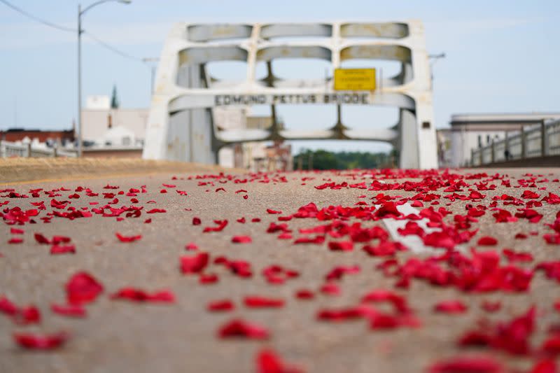 Rose petals are scattered on the Edmund Pettus Bridge in Selma