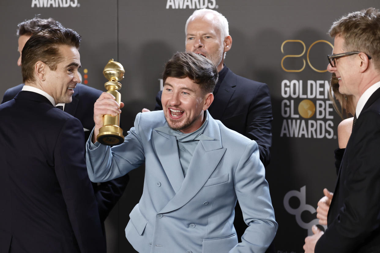 BEVERLY HILLS, CALIFORNIA - JANUARY 10: (L-R) Peter Czernin, Colin Farrell, Barry Keoghan, Martin McDonagh, and Graham Broadbent, winners of Best Picture - Musical/Comedy for 