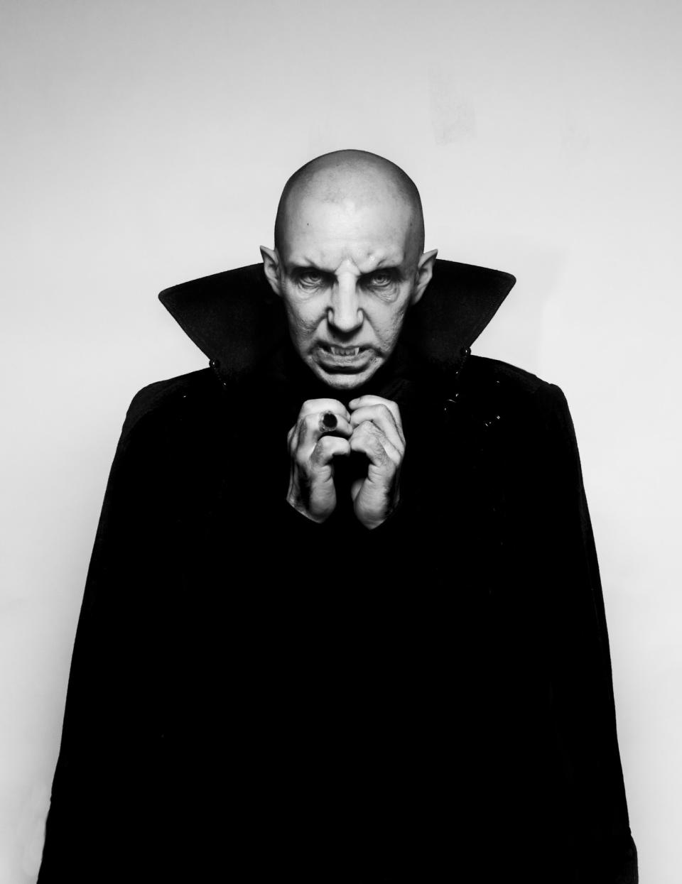 A man dressed as a vampire