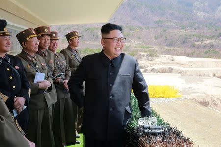 North Korean Leader Kim Jong Un observes a target-striking contest by the Korean People's Army (KPA) in this undated photo, released by North Korea's Korean Central News Agency (KCNA), April 13, 2017. REUTERS/KCNA