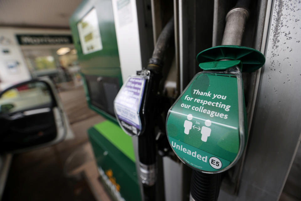 Petrol prices A notice telling people to stay 2 metres apart is seen at a petrol station, following the outbreak of the coronavirus disease (COVID-19), Stone, Britain, April 28, 2020. REUTERS/Carl Recine