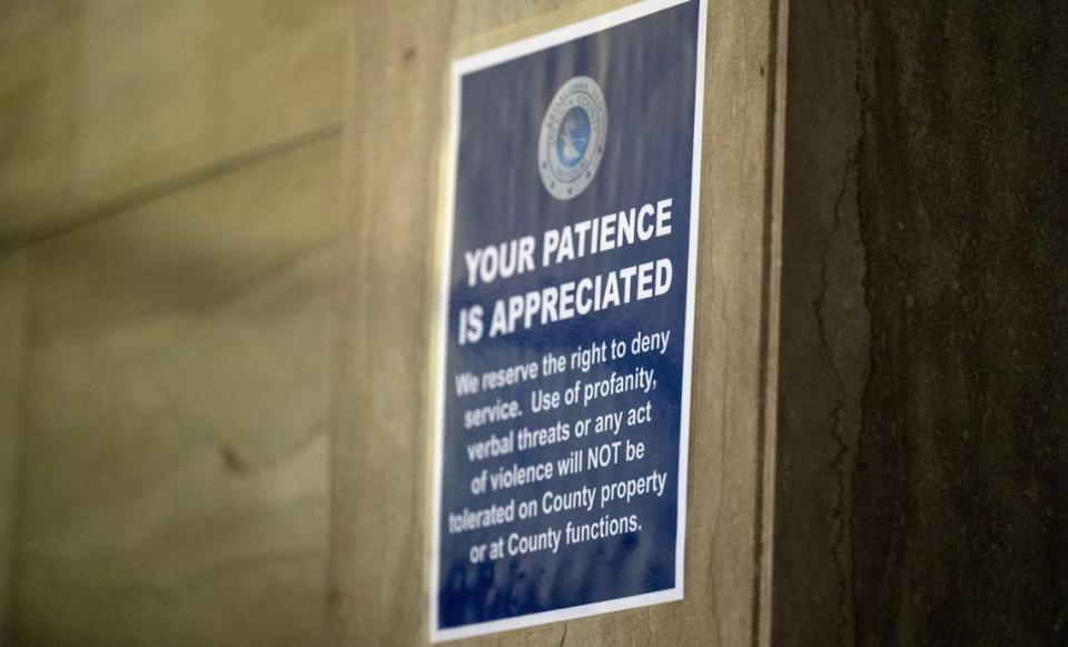 A sign urges people to act respectfully while waiting to register personal property documents with the Jackson County Assessment office on Friday, March 29, 2024, in Independence, Missouri. Nick Wagner/nwagner@kcstar.com