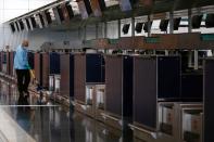 A cleaner works at Hong Kong International Airport, following the novel coronavirus disease (COVID-19) outbreak, in Hong Kong