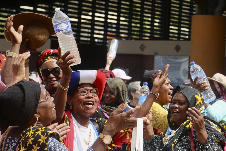 Demonstrators gather to protest the water crisis in Mamoudzou, on the French Indian Ocean territory of Mayotte, Wednesday, Sept. 27, 2023. A protest movement called ’’Mayotte is Thirsty″ is demanding accountability for alleged embezzling, leaks and lack of investment in sustainable water supplies. (AP Photo/Gregoire Merot)