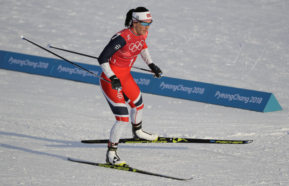 Marit Bjoergen captured her record 14th Winter Olympics medal on Wednesday with a bronze in the team ski sprint. (AP Photo/Kirsty Wigglesworth)