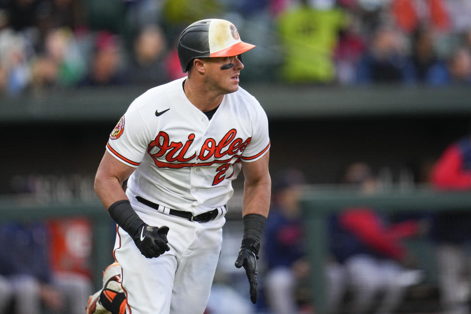 Baltimore Orioles' James McCann looks on as he flies out to Boston Red Sox center fielder Jarren Duran during the second inning of a baseball game, Monday, April 24, 2023, in Baltimore, Md. (AP Photo/Julio Cortez)