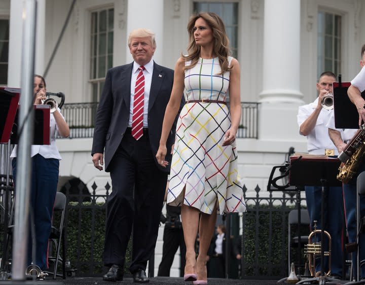 The internet was quick to note that Melania’s £1,700 grid print A-line dress was produced in England by a Greek designer [<em>Photo: Getty]</em>