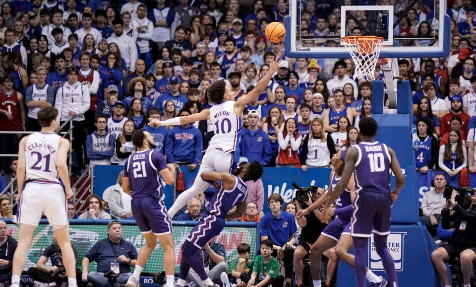 Kansas forward Jalen Wilson (10) gets inside for a bucket against TCU during the second half of a game on Saturday inside Allen Fieldhouse in Lawrence. TCU defeated Kansas, 83-60.