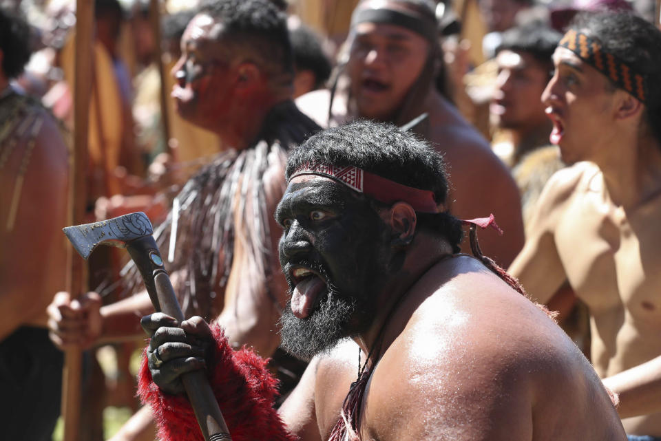 Maori perform a welcome Dhaka for New Zealand Prime Minister Christopher Luxon and officials at the Waitangi Treaty House marae ahead of Waitangi Day celebrations in Waitangi, northern New Zealand, Monday, Feb. 5, 2024. In a fiery exchange at the birthplace of modern New Zealand, Indigenous leaders strongly criticized the current government's approach to Maori, ahead of the country’s national day. (Michael Cunningham/NZ Herald via AP)