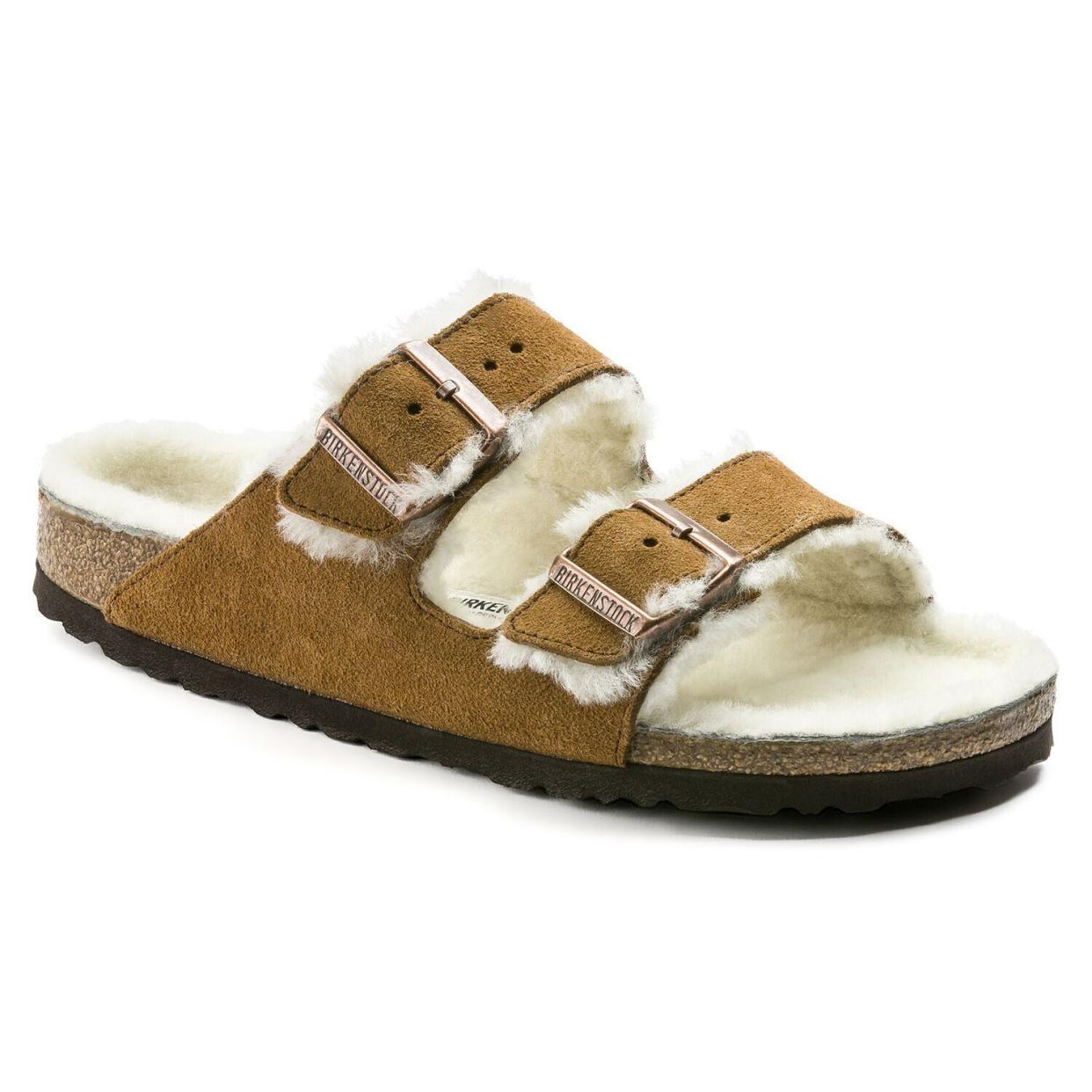 Get the <a href="https://www.birkenstock.com/us/arizona-suede-leather/arizona-shearling-suedeleather-0-eva-u_491.html?gclid=Cj0KCQiA0fr_BRDaARIsAABw4EunoiX3oKkXcAOszkC4XBOA4FLrn7oIRdQkAzDNOkAaB4RKGra0ZwcaAg_JEALw_wcB" target="_blank" rel="noopener noreferrer">Birkenstock Arizona shearling sandal﻿</a> for $150.