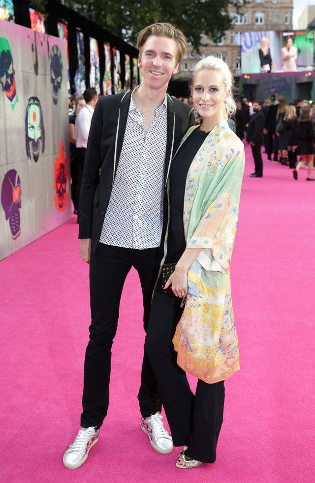 Poppy Delevingne and James Cook on the pink carpet at the European premiere of “Suicide Squad” in London