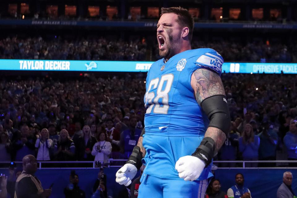 Detroit Lions offensive tackle Taylor Decker (68) takes the field during introduction before the between Detroit Lions and Carolina Panthers at Ford Field in Detroit on Sunday, Oct. 8, 2023.